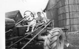 Dennis and George Behselich  on WC Allis tractor